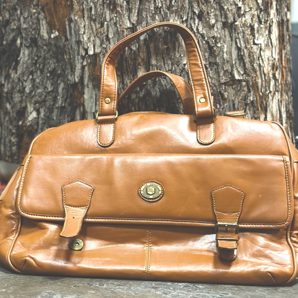 Le Drago tan leather messenger/laptop/duffel bag/suitcase.